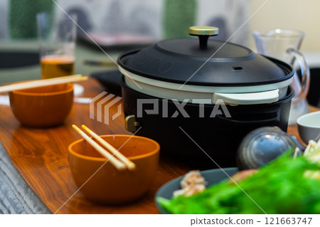 Stylish hot plate and pot 121663747