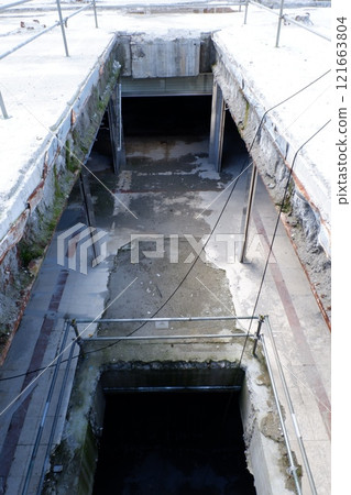 Demolition site of the basement of a building 121663804