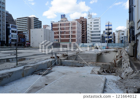 Foundation of a building being demolished 121664012