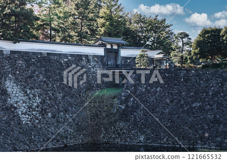 A stately view of the moat overlooking Kitahanebashimon Gate on the north side of the East Gardens of the Imperial Palace 121665532