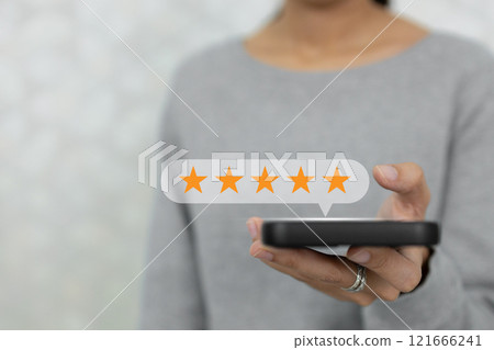satisfaction survey feedback concept. review ranking marketing customer service. woman using smartphone customer satisfaction check star rating. satisfaction survey feedback concept. review ranking marketing customer service. woman using smartphone customer satisfaction check star rating. 121666241