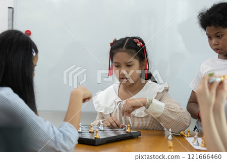 children playing chess board game education strategy classroom. Training for brain development. children playing chess board game education strategy classroom. Training for brain development. 121666460