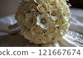 white wedding bouquet with white roses 121667674