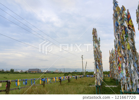 Fluttering pieces of cloth with sacred texts - 'Him Morin' - symbols of Buddhism, near the village 121667720