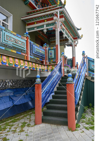 The porch of the Nogoon Dari Ehin building at Buddhist Monastery in Ivolginsky Datsan in Buryatia The porch of the Nogoon Dari Ehin building at Buddhist Monastery in Ivolginsky Datsan in Buryatia 121667742