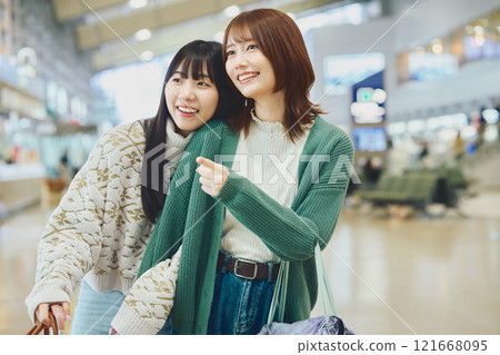 Two women on a trip 121668095