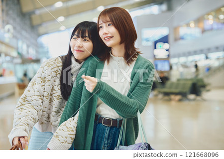 Two women on a trip 121668096