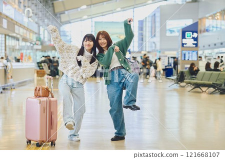 A woman having fun at the airport 121668107