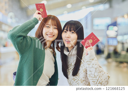 A woman with a passport 121668125