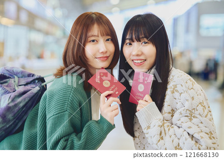 A woman with a passport 121668130