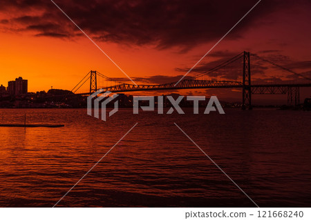 Old Hercilio luz cable bridge with sunset in Florianopolis 121668240