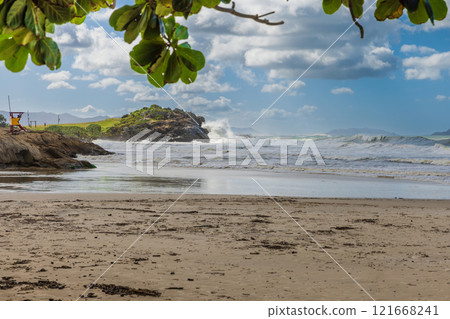 Coastline with rocks, beach and ocean with waves in Brazil. Matadeiro Beach in Florianopolis 121668241