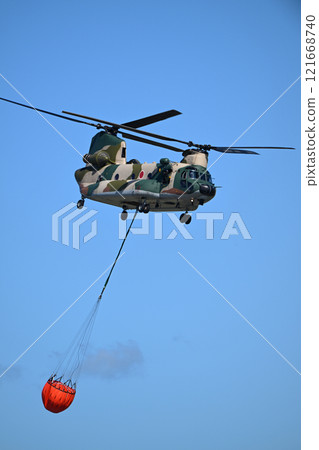 Japan Air Self-Defense Force CH-47J conducting firefighting training 121668740