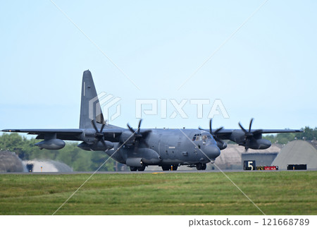 US Air Force C-130 transport plane landing 121668789