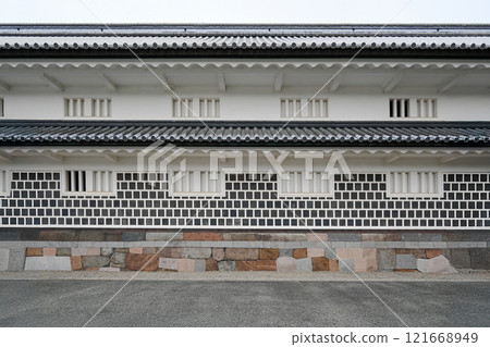 Stone wall texture background - old building techniques, geometric architecture, tiled roof Stone wall texture background - old building techniques, geometric architecture, tiled roof 121668949