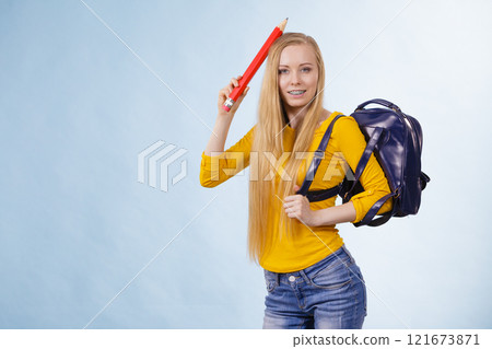 Young woman going to school 121673871