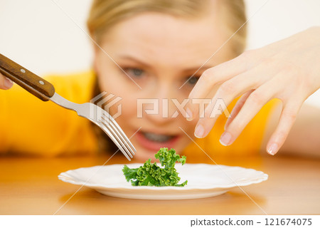 Sad young woman being on diet Sad young woman being on diet 121674075