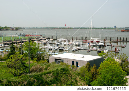 Pier with boats and sailing yachts, Brooklyn Heights, NY, USA Pier with boats and sailing yachts, Brooklyn Heights, NY, USA 121674335