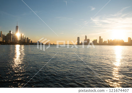 View of the skyscrapers of Manhattan from the water, New York landscape from the waterfront View of the skyscrapers of Manhattan from the water, New York landscape from the waterfront 121674407