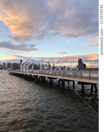 View of the skyscrapers of Manhattan from the water, New York landscape from the waterfront 121674542