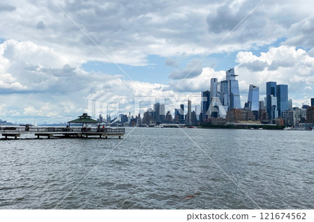 View of the skyscrapers of Manhattan from the water, New York landscape from the waterfront View of the skyscrapers of Manhattan from the water, New York landscape from the waterfront 121674562