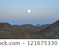Night view with a moon above mountains in Negev desert in Israel 121675330