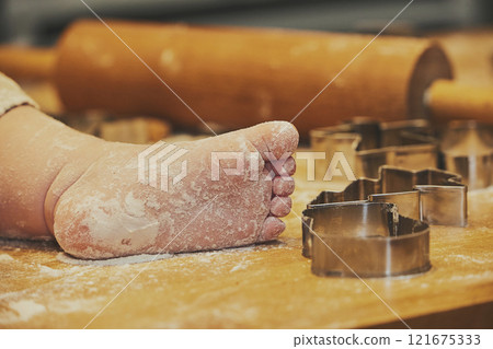 A family with children makes cookies. Close-up A family with children makes cookies. Close-up 121675333