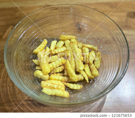 French fries in bowl isolated on white French fries in bowl isolated on white 121675653