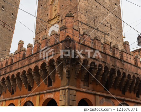 Views of city of Bologna in Italy. facades houses are bright terracotta shades 121676371