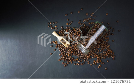 Morning coffee. spiced coffee. Winter hot drink. Scattered coffee consumers on a dark table. Top view, flat lay. Morning coffee. spiced coffee. Winter hot drink. Scattered coffee consumers on a dark table. Top view, flat lay. 121676721
