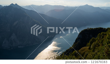 Panoramic View of Lake and Mountains at Sunset Panoramic View of Lake and Mountains at Sunset 121678163