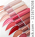 Shades of lip gloss different tones color stroke on white background. Lip gloss colorful palette of smears.  121678208