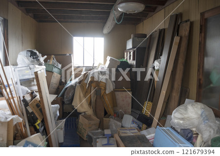 A pile of trash in an abandoned house A pile of trash in an abandoned house 121679394