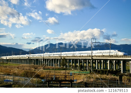Snow-covered Mt. Ibuki and the Shinkansen 121679513