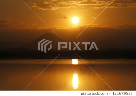 Mount Mikami and sunrise seen from Lake Kihama Mount Mikami and sunrise seen from Lake Kihama 121679555