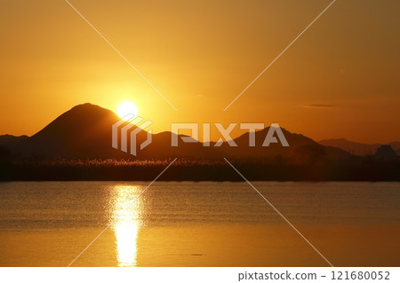 Mount Mikami and sunrise seen from Lake Kihama Mount Mikami and sunrise seen from Lake Kihama 121680052