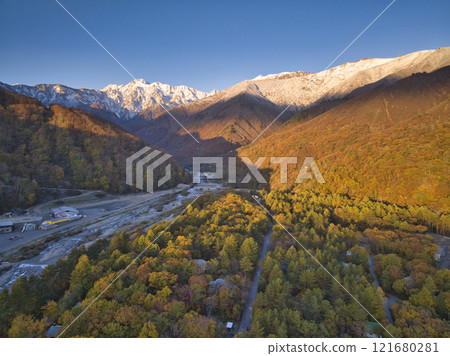 Beautiful Mt. Goryu and the three-tiered autumn foliage seen from the Gentaro area, Hakuba Village, Nagano Prefecture (aerial photography by drone) Beautiful Mt. Goryu and the three-tiered autumn foliage seen from the Gentaro area, Hakuba Village, Nagano Prefecture (aerial photography by drone) 121680281