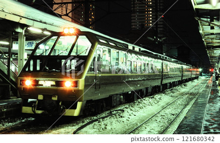 An Alpha Continental stopping at Sapporo Station at night in 1987 121680342