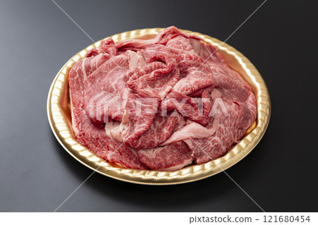 Beef shoulder loin for sukiyaki on a black background 121680454