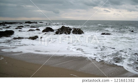 Rough winter sea of Japan and whitecaps 121681382