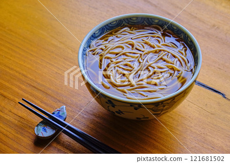 Soba noodles on a wooden table 121681502