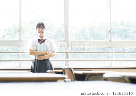 Portrait of a high school girl looking at the camera Portrait of a high school girl looking at the camera 121683110