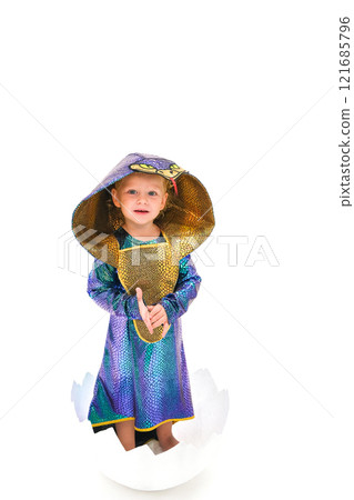 Child in a snake costume in an egg 121685796