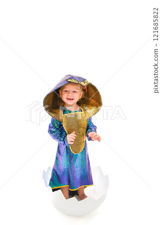 Child in a snake costume in an egg Child in a snake costume in an egg 121685822