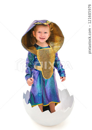 Child in a snake costume in an egg 121685976
