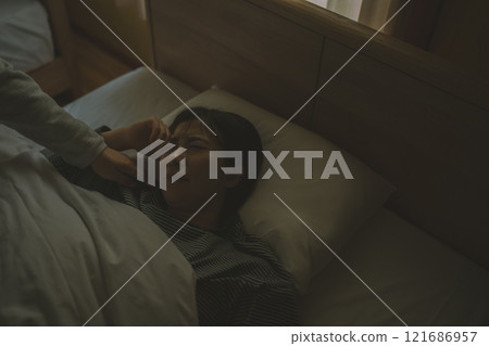 A woman who doesn't want to be woken up in the morning A woman who doesn't want to be woken up in the morning 121686957