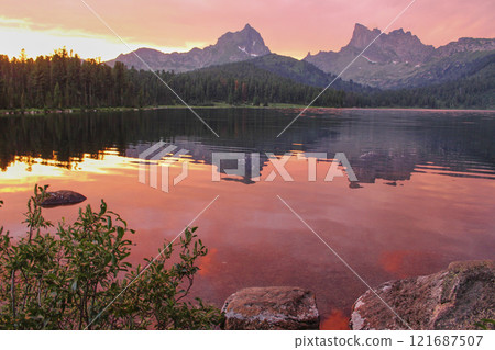 Incredibly beautiful sunset landscape, observation from shore of mountain lake 121687507