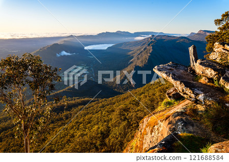 Stunning sunrise panoramic view from Boroka Lookout towards Halls Gap, Grampians, Victoria, Australia Stunning sunrise panoramic view from Boroka Lookout towards Halls Gap, Grampians, Victoria, Australia 121688584