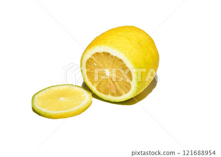 Juicy lemon fruit and a slice cut from it. Juicy lemon fruit and a slice cut from it. 121688954