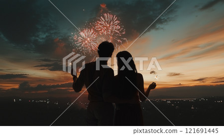 couple watching fireworks 121691445